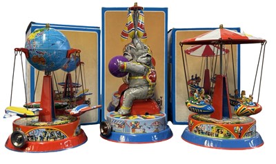 Lot 195 - Three boxed Wilesco tinplate toys, to include:...