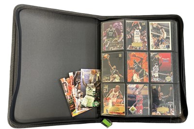Lot 166 - ONE BINDER: Various collectible basketball...