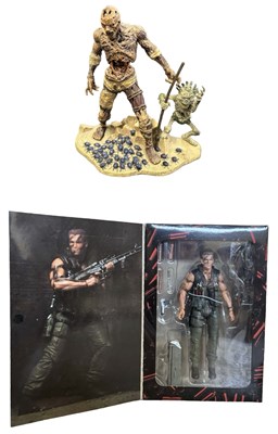 Lot 119 - A boxed Arnold Schwarzenegger Commando figure...
