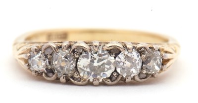 Lot 6 - An 18ct five stone diamond ring, the five...