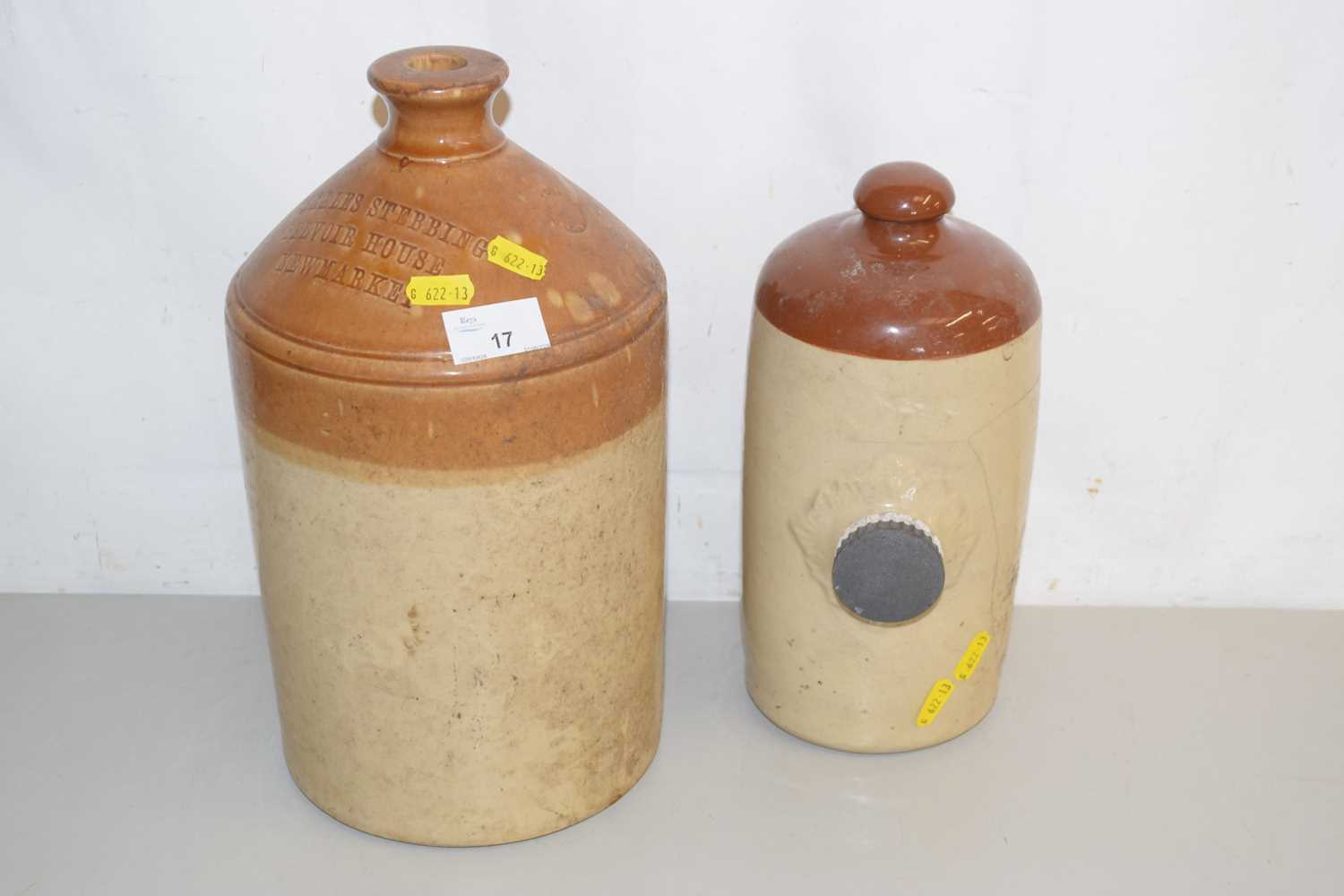Lot 17 - A stone ware hot water bottle and a Newmarket...