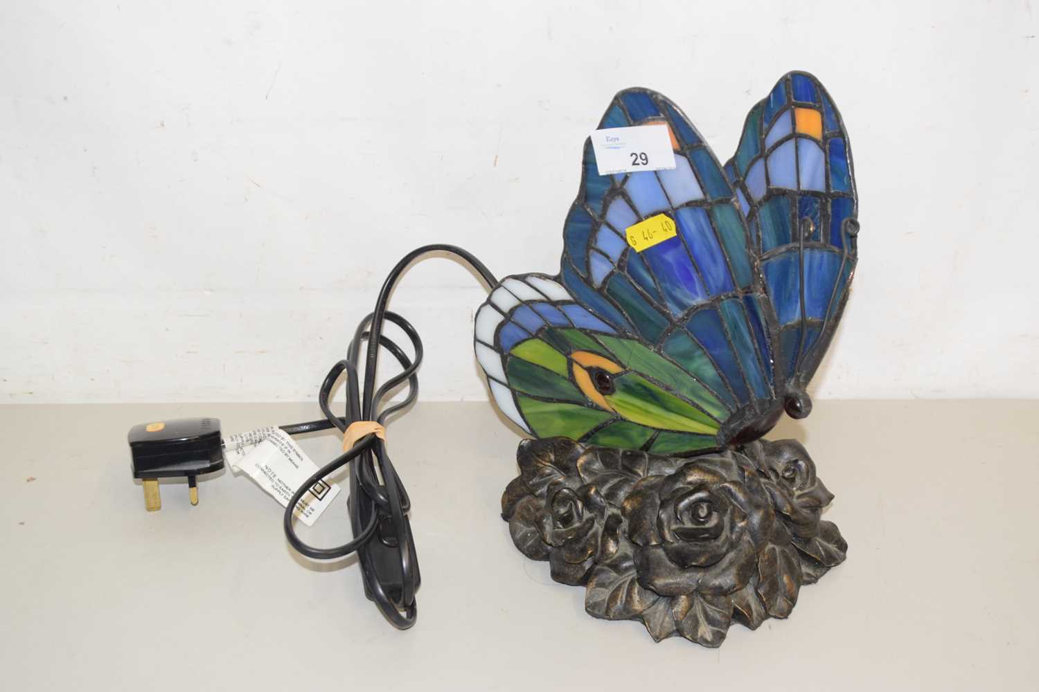 Lot 29 - A reproduction Tiffany style butterfly lamp