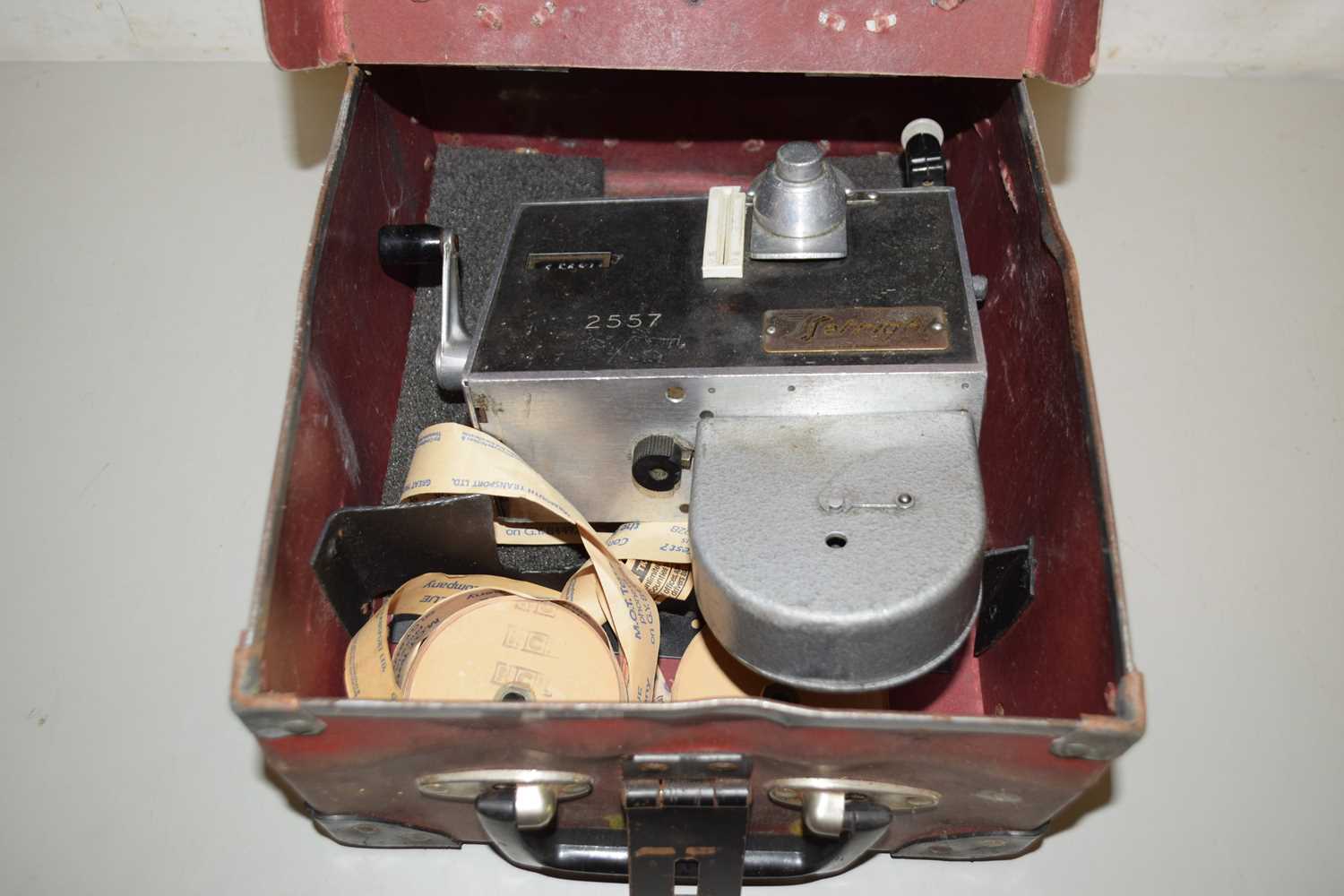 Lot 56 - A Setright bus ticket machine together with...