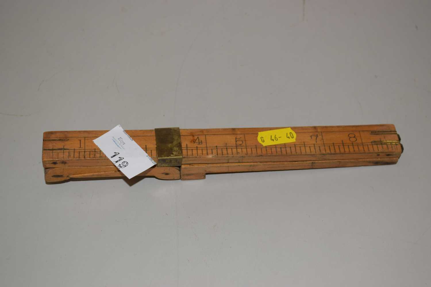 Lot 119 - A folding wooden ruler