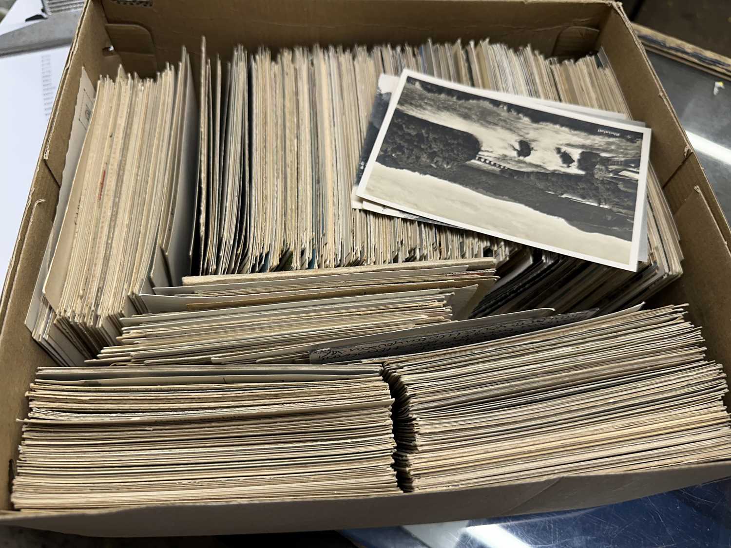 Lot 116 - Box of mixed postcards to include a good range...