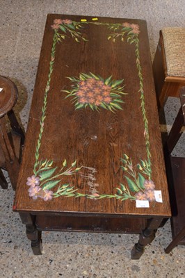 Lot 329 - A floral painted coffee table
