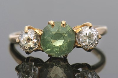 Lot 407 - A diamond and chrysoberyl ring, with central...