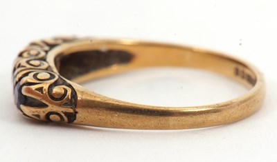 Lot 24 - A 9ct five stone sapphire ring, the slightly...