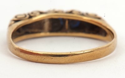 Lot 24 - A 9ct five stone sapphire ring, the slightly...