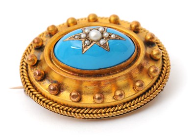 Lot 55 - An Archeological revival brooch, with central...