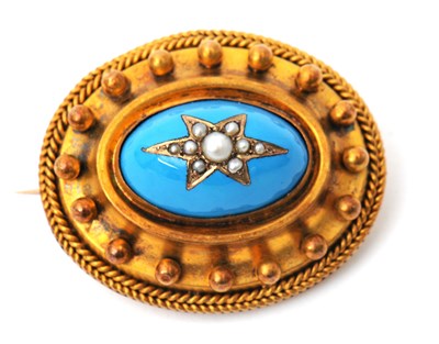 Lot 55 - An Archeological revival brooch, with central...