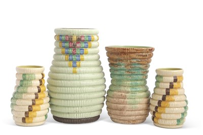 Lot 11 - A group of four Clarice Cliff raffia vases...
