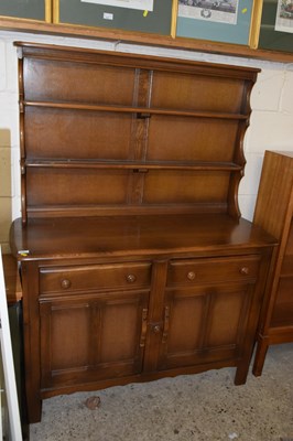 Lot 365 - An Ercol dresser