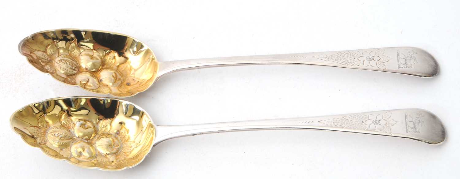 Lot 61 - A pair of George IV silver berry spoons,...