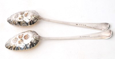 Lot 61 - A pair of George IV silver berry spoons,...