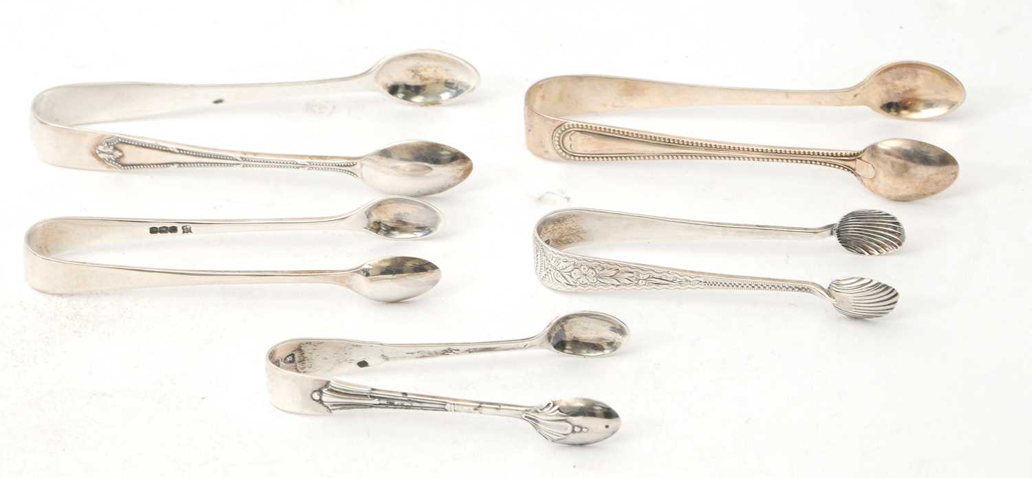 Lot 66 - Five pairs of silver sugar tongs, various...