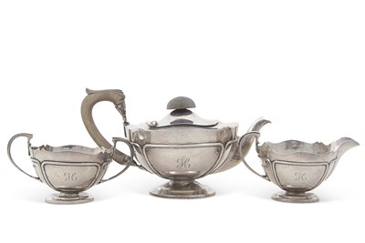 Lot 301 - A George V silver three piece tea service of...