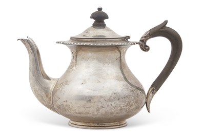 Lot 302 - A George V silver teapot of plain circular...