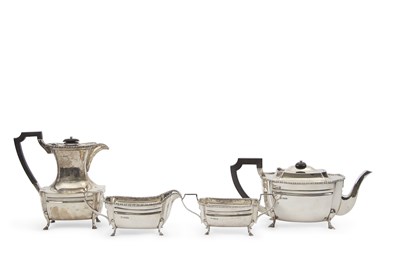 Lot 313 - A George V silver four piece tea service...