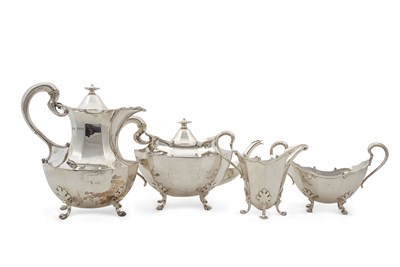 Lot 314 - A George V Scottish silver four piece tea...