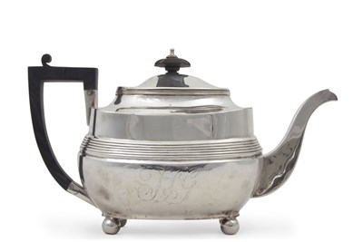 Lot 333 - A George III silver teapot of rounded...