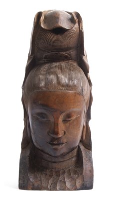 Lot 459 - A South East Asian carved hardwood head of a...