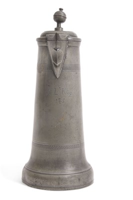 Lot 454 - An early 18th Century pewter flagon the hinged...