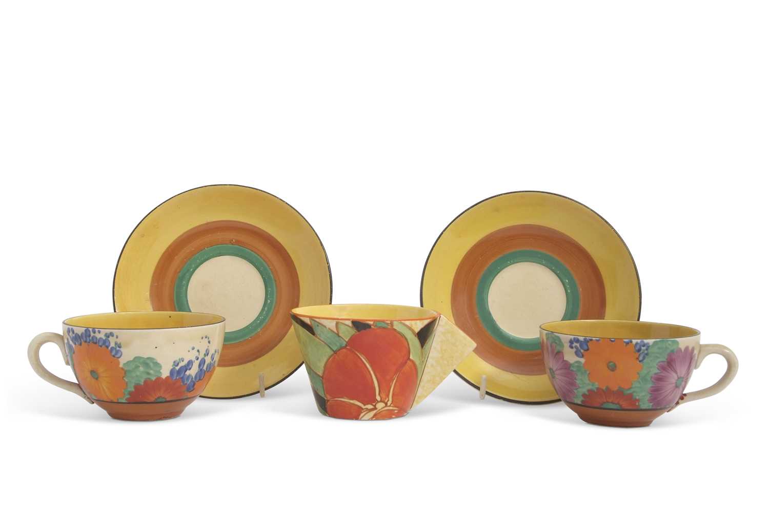 Lot 10 - Two Clarice Cliff cups and saucers in the Gay...