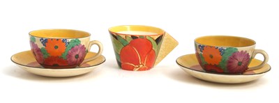 Lot 10 - Two Clarice Cliff cups and saucers in the Gay...