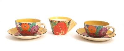 Lot 10 - Two Clarice Cliff cups and saucers in the Gay...