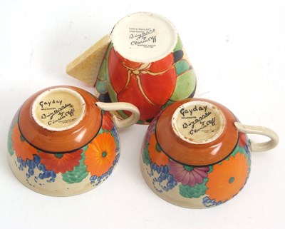 Lot 10 - Two Clarice Cliff cups and saucers in the Gay...
