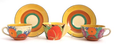 Lot 10 - Two Clarice Cliff cups and saucers in the Gay...