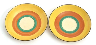 Lot 10 - Two Clarice Cliff cups and saucers in the Gay...