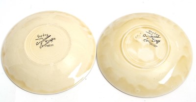 Lot 10 - Two Clarice Cliff cups and saucers in the Gay...