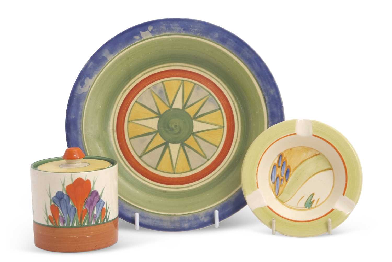 Lot 12 - A Clarice Cliff jam pot in the Crocus pattern...