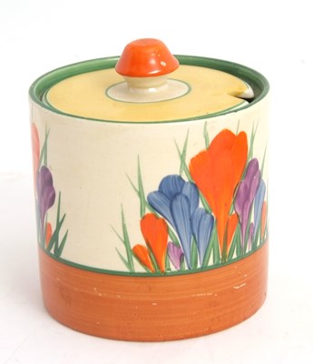 Lot 12 - A Clarice Cliff jam pot in the Crocus pattern...