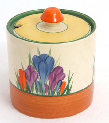 Lot 12 - A Clarice Cliff jam pot in the Crocus pattern...