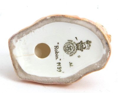 Lot 16 - A Royal Doulton miniature figure of a robin,...