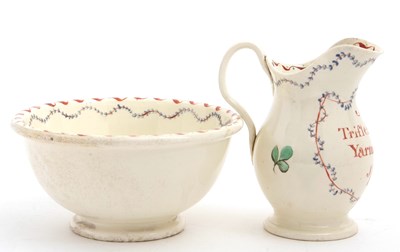 Lot 23 - A late 18th Century cream ware jug and bowl,...