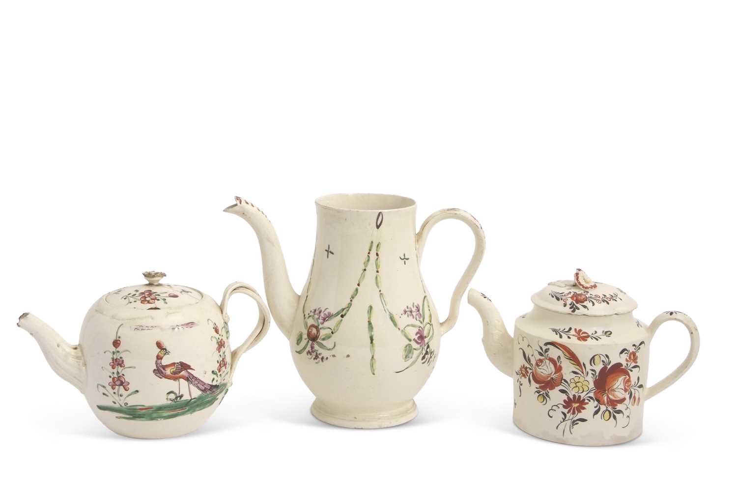Lot 24 - Two late 18th Century cream ware teapots and...