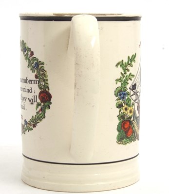 Lot 25 - A large cream ware tankard with a galleon and...