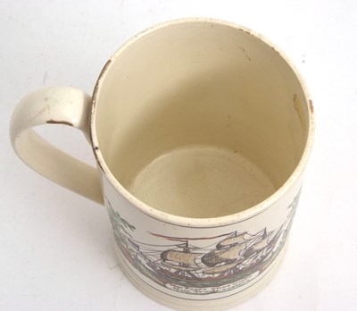 Lot 25 - A large cream ware tankard with a galleon and...