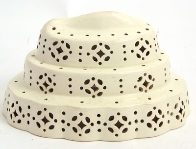Lot 26 - A rare late 18th Century cream ware curd...