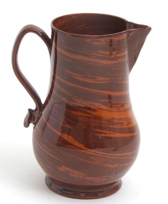Lot 28 - A rare mid 18th Century Astbury agate ware jug...