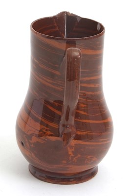 Lot 28 - A rare mid 18th Century Astbury agate ware jug...