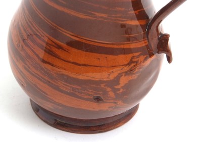 Lot 28 - A rare mid 18th Century Astbury agate ware jug...
