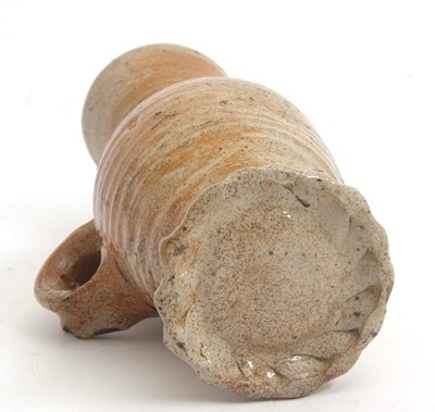 Lot 29 - An interesting Medieval pottery jug of ribbed...