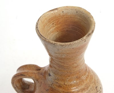 Lot 29 - An interesting Medieval pottery jug of ribbed...
