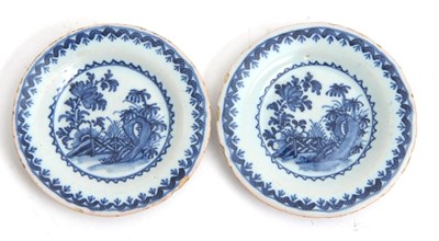 Lot 34 - An unusual pair of Delft miniature plates, the...