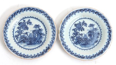 Lot 34 - An unusual pair of Delft miniature plates, the...